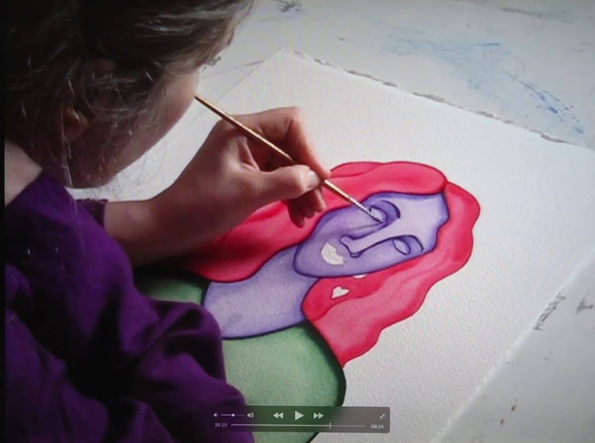 video still of Rita painting
